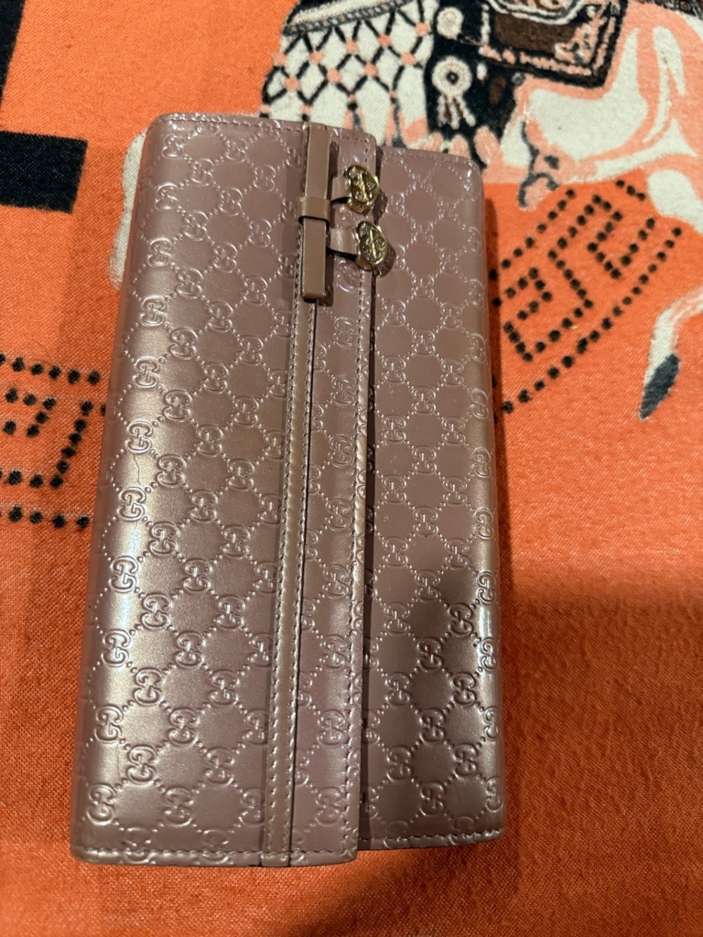 Gucci Embossed GG Continental Wallet in Dusty Rose Pink with Gold Accents